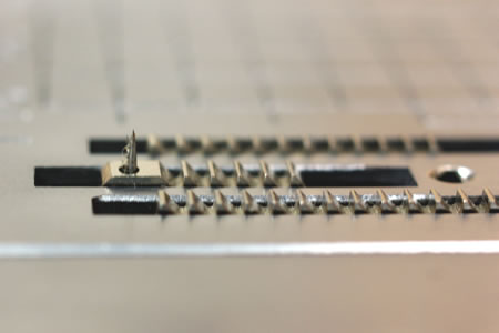 ブラザー独自の布送り針